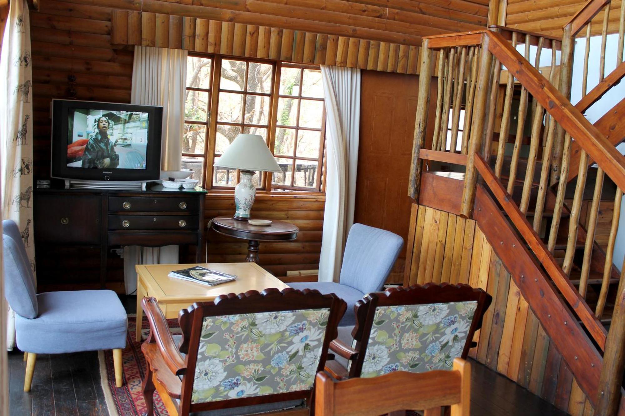 Ndlovu Log Dinokeng Casa de Férias *